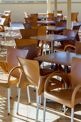 Restaurant empty tables and chairs in Greece, Corfu