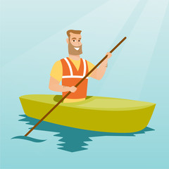 Young caucasian man travelling by kayak.