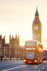The Big Ben, House of Parliament and double-decker bus blurred in motion, London, UK
