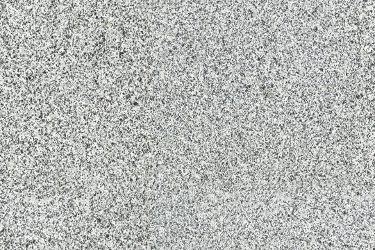 Seamless repeating texture of gray granite pattern. Granite background texture.