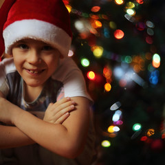 Boy near christmas tree