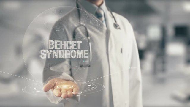 Doctor holding in hand Behcet Syndrome