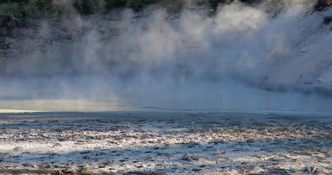 Steam rising from white geyser basin 4k 24fps
