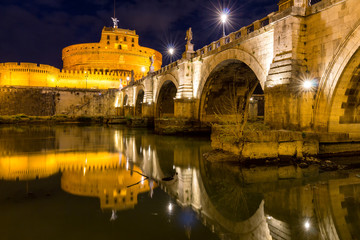 Rome, Italy. Ponte Sant Angelo, Castel Sant Angelo and Tiber River. Built by Hadrian emperor as mausoleum in 123AD ancient Roman Empire landmark.