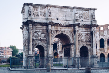 Fototapeta na wymiar Arch of Constantine and coliseum in background at Rome, Italy