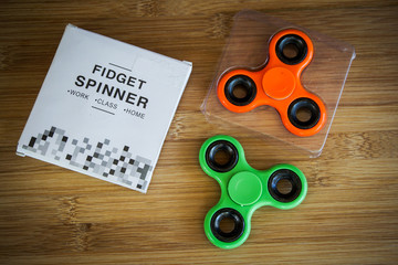 Colorful Fidget finger spinner stress, anxiety relief toy.