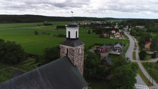 Kemio church, Aerial view around old medieval stone church revealing kemio town, on a summer day, in Kemionsaari, varsinais-suomi, Finland