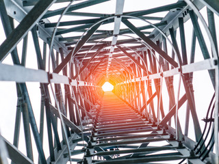 Looking up through tunnel of Telecommunication tower, Way of success concept 