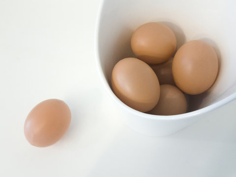 Brown Eggs in a bowl n white
