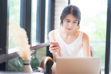 businesswoman working with modern devices, student girl using digital tablet computer and mobile smart phone,business concept,selective focus,vintage color