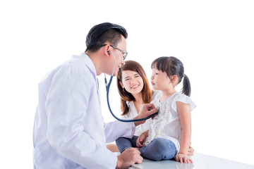 Doctor examining a girl by stethoscope over white background