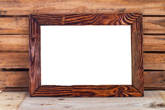 Vintage blank photo on wooden table