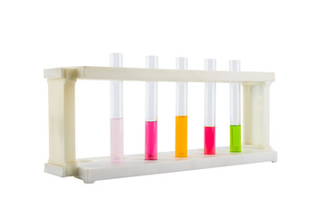 Multicoloured test tubes in the stand isolated on white