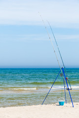 Fishing rod left alone on sea shore