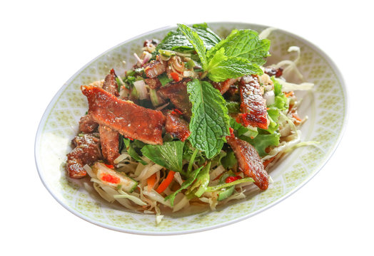 Sliced grilled beef salad, Thai food on white background