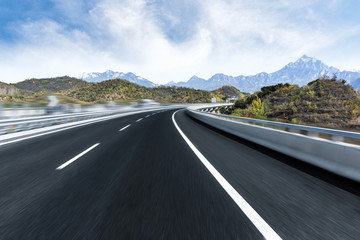 modern highway through mountains in city of China.