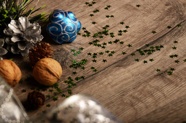 Christmas background of nuts stripes and decorations