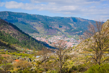 Fototapeta na wymiar View of the village of Manteigas in the glacial valley of the Zezere river. Serra da Estrela mountains. County of Guarda. Portugal