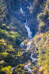 Small waterfalls in the glacial valley of the Zezere river in the Serra da Estrela mountains. County of Guarda. Portugal