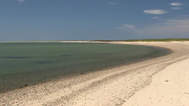 Secluded rocky beach on south monomoy island Cape Cod on summer day