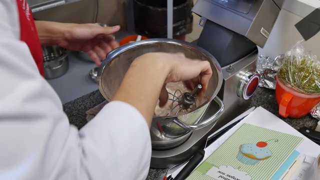 Preparation of dough, kneading, female hands
