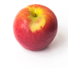 Red jazz apple on a white background