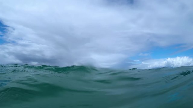 POV Shot Of Gentle Waves Rolling Over Camera In Open Water, Maui, Hawaii