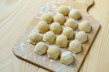 Dumplings - Russian traditional food. Dumplings with meat