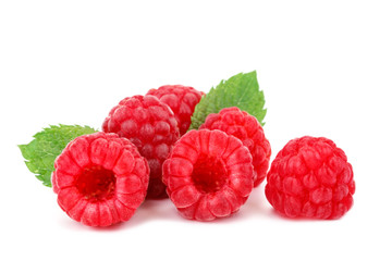 Obraz na płótnie Canvas Tasty ripe raspberries on a white background.