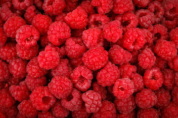 Background of ripe tasty raspberries.