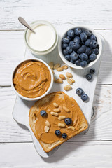 toast with peanut butter and blueberry, top view