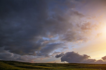 Fototapeta na wymiar Sunset in the steppe, a beautiful evening sky with clouds, plato Ukok, no one around, Altai, Siberia, Russia
