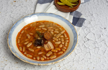 Stew of beans with chorizo and pork