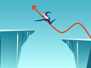 Businessman with arrow sign jump through the gap between hill. Running and jump over cliffs. Business risk and success concept.
