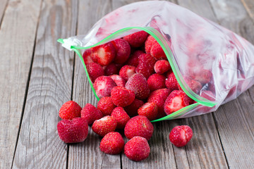 Frozen strawberries in a plastic bag