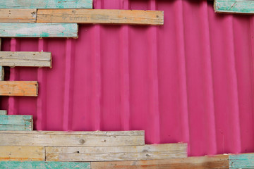 Purple background with old wooden boards