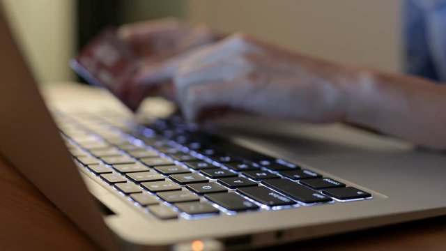 Payment on credit card with laptop computer