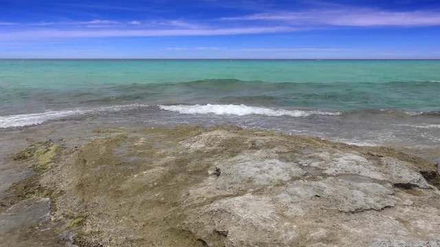 Balearic Ibiza Formentera turquoise beach with very small waves, 4 K video