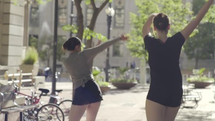 Beautiful Ballerinas Practice Dance Choreography Together In City Park (Slow Motion)