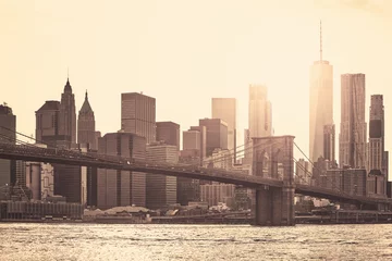 Poster Manhattan bij zonsondergang, sepia toning toegepast, New York City, USA. © MaciejBledowski