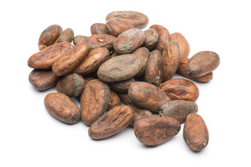 heap of cocoa beans on white background