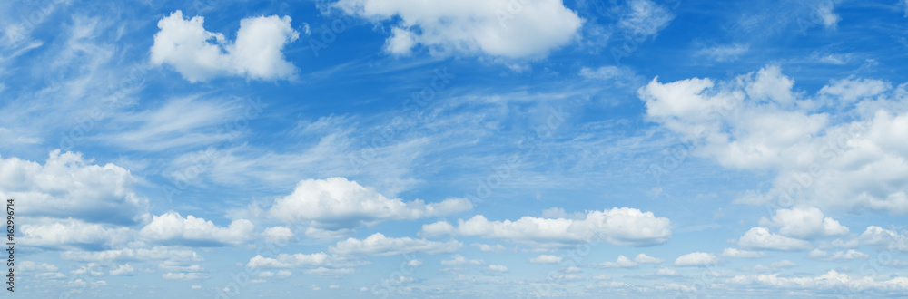 Wall mural Sunny blue sky backgrond with clouds Panorama Photo