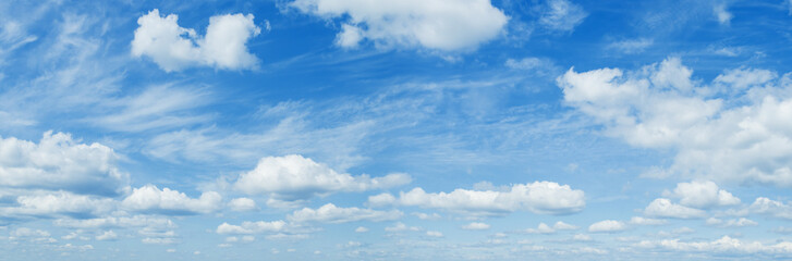 Fototapeta na wymiar Sunny blue sky backgrond with clouds Panorama Photo