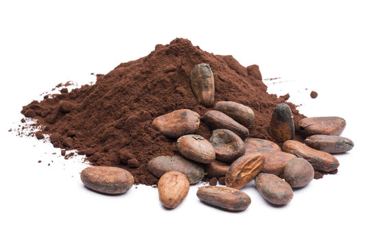 heap of dark cocoa powder with cocoa beans on white background