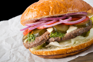 Huge burger on a wrapping paper