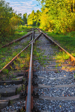 Landscape view of the old railway tracks in autumn
