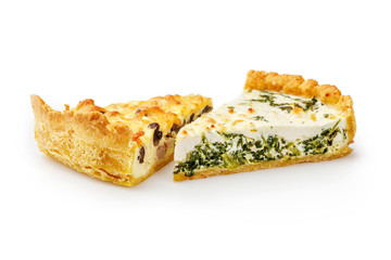 Two slices of spinach and chicken pies isolated on white