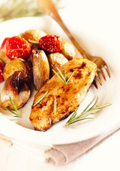 Chicken Breast with Baked Potatoes and Cherry Tomatoes