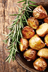 Rustic baked potatoes with rosemary