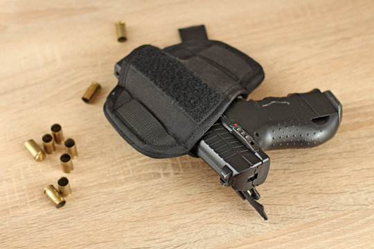 real hand gun pistole with ammo